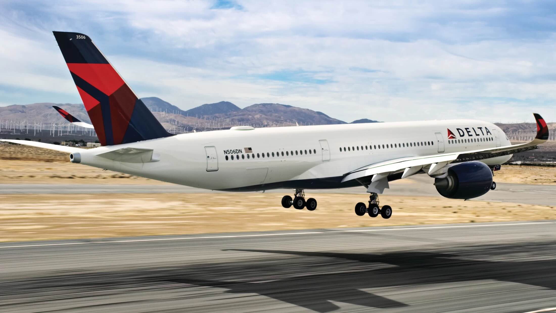 a white airplane taking off