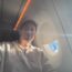 a man taking a selfie in an airplane