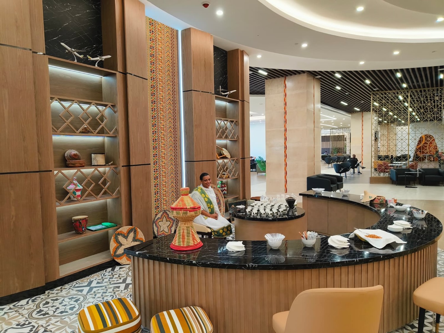 a man sitting at a counter in a hotel