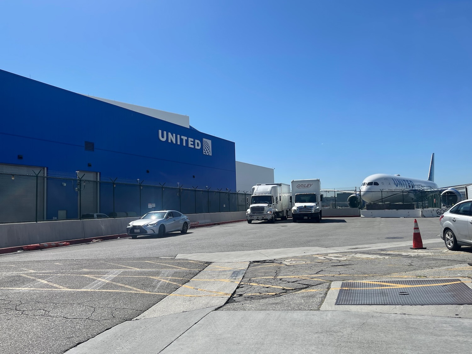 a group of trucks parked in a parking lot