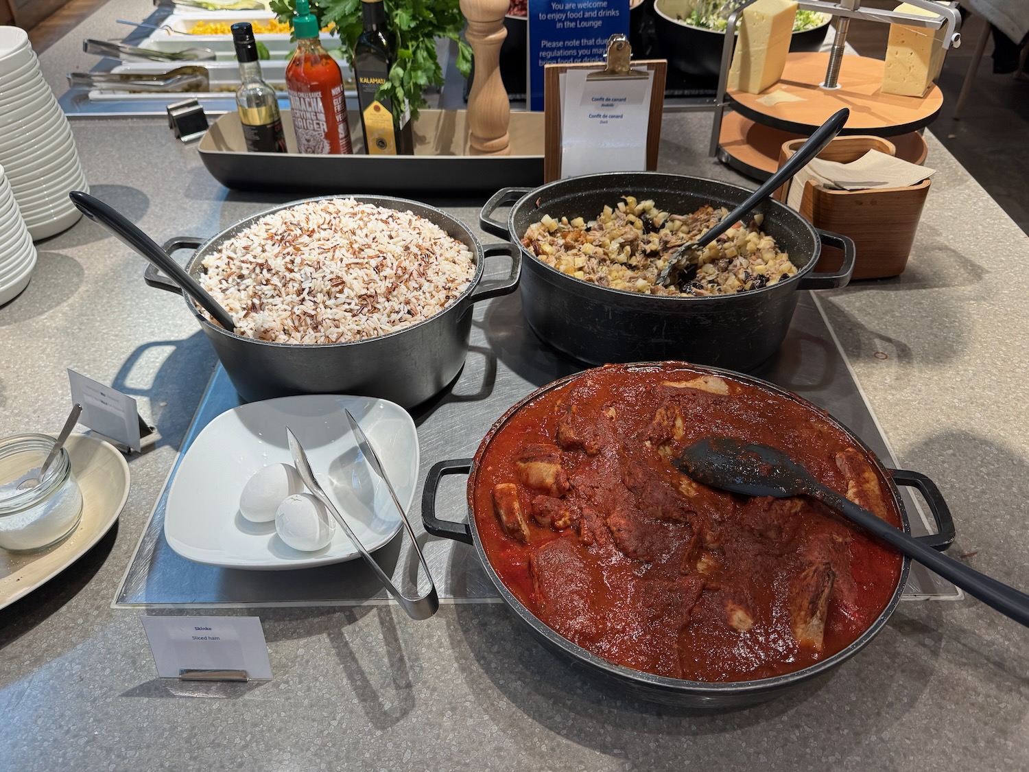 a group of bowls of food on a table