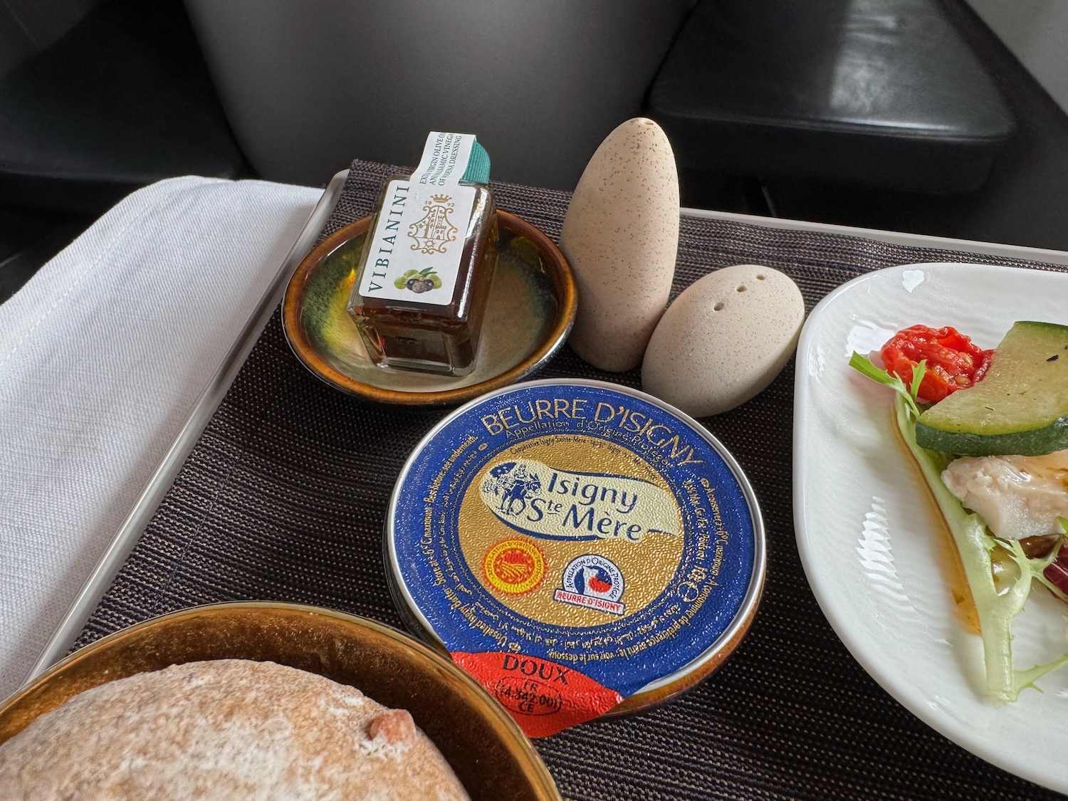 food on a tray with a plate of food