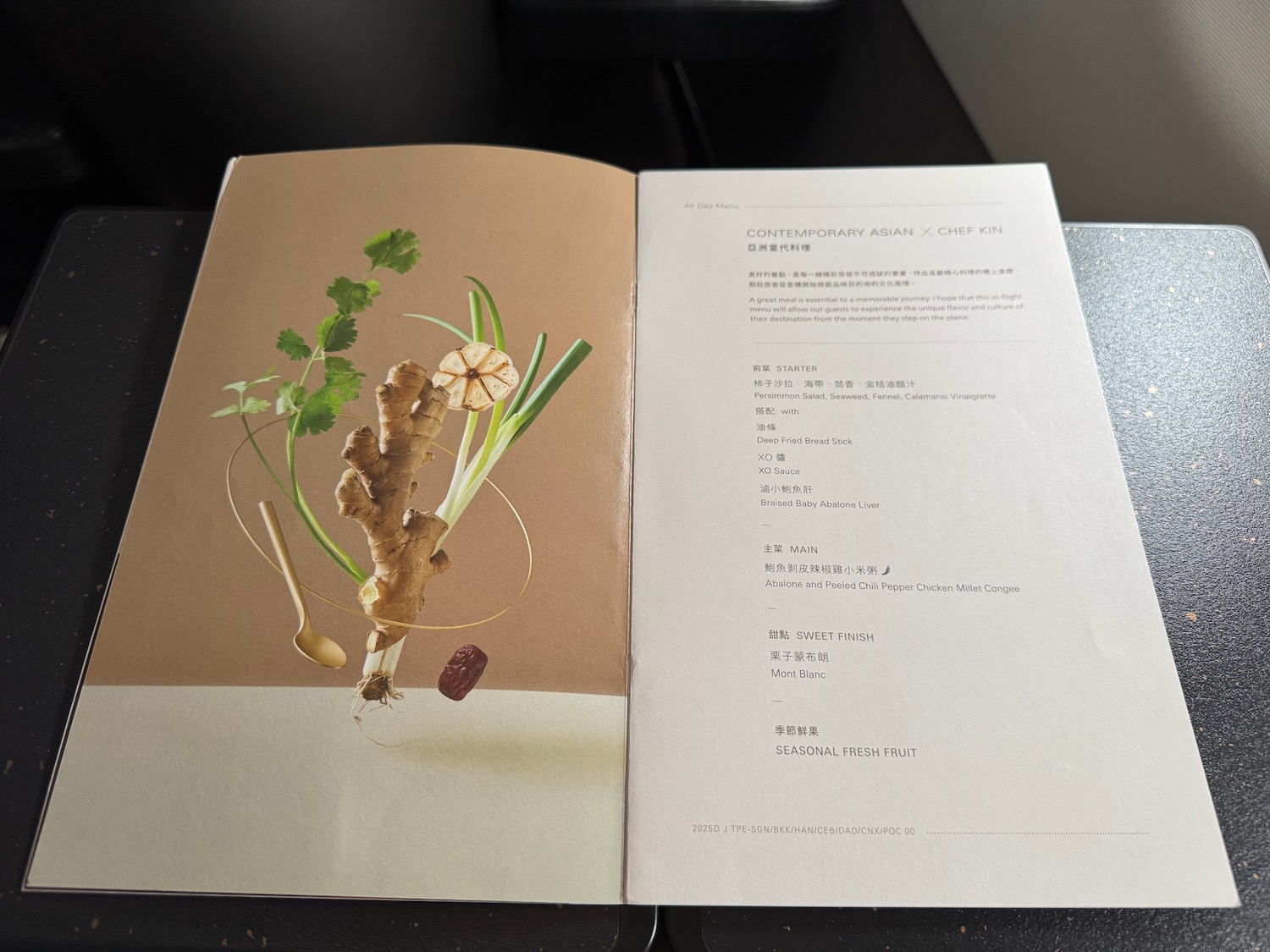 a book open with a picture of ginger and herbs
