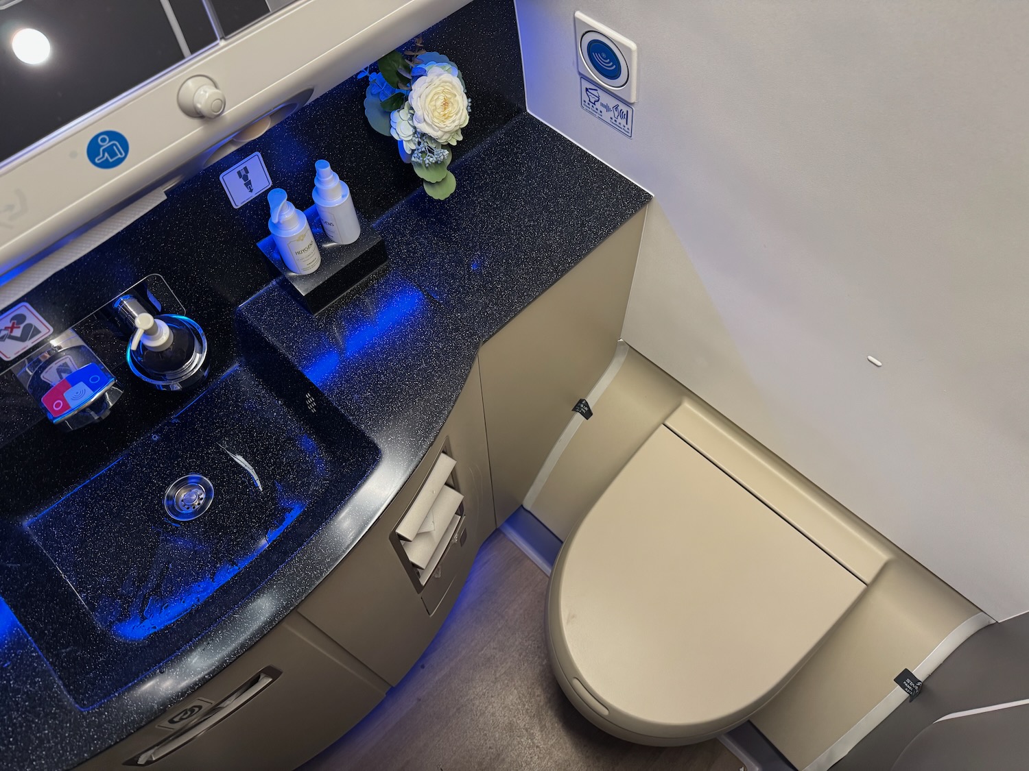 a bathroom with a sink and toilet