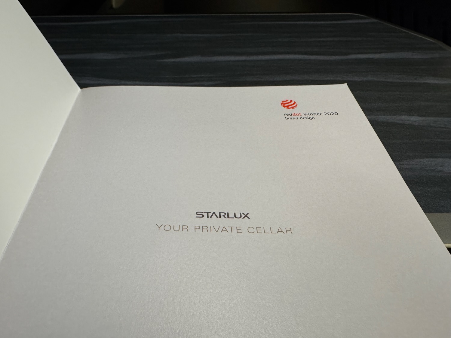 a white paper with a logo on it