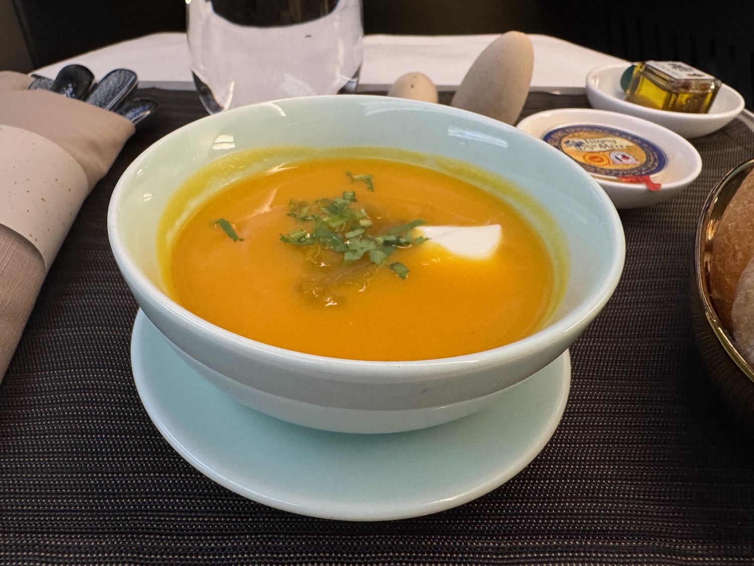 a bowl of soup on a plate