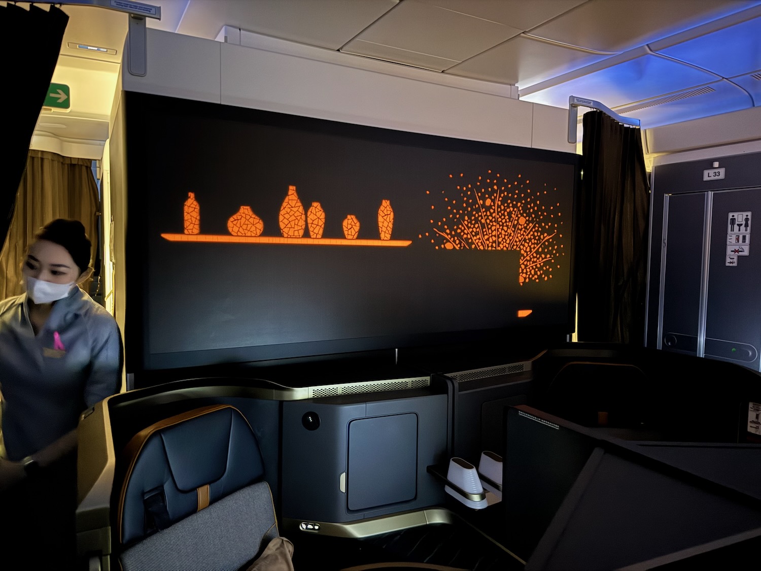 a large screen with orange lights on it