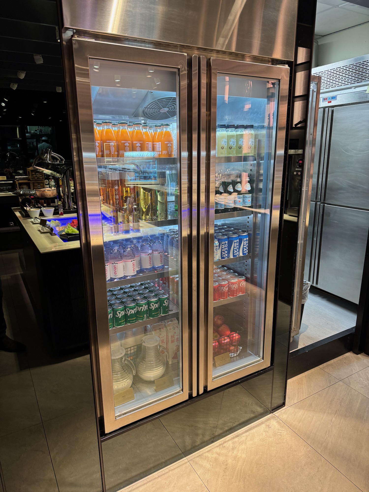a refrigerator with drinks in it