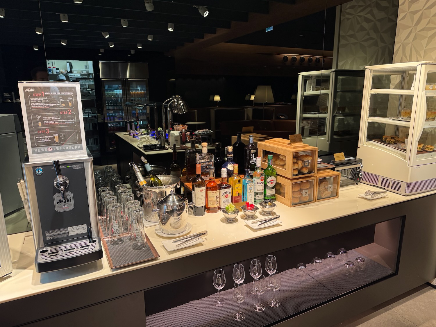 a bar with bottles and glasses