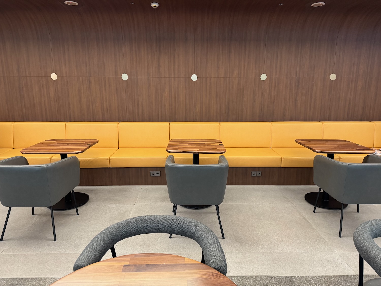 a yellow booth seating in a room