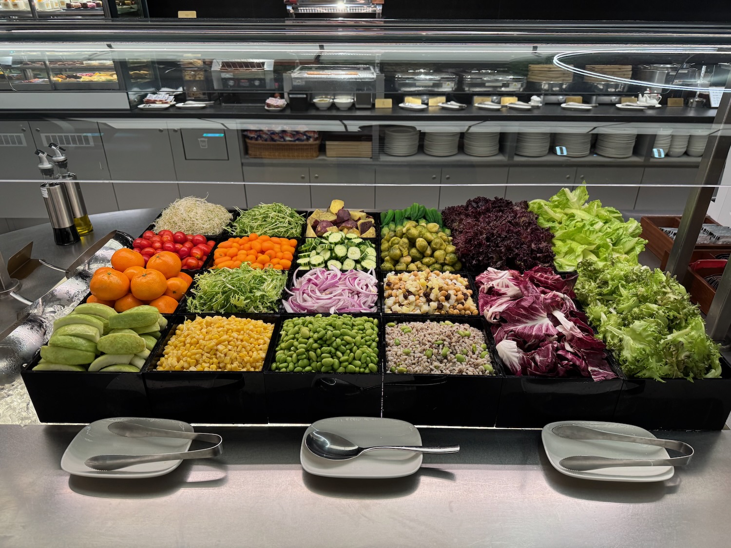 a large display of vegetables and fruits