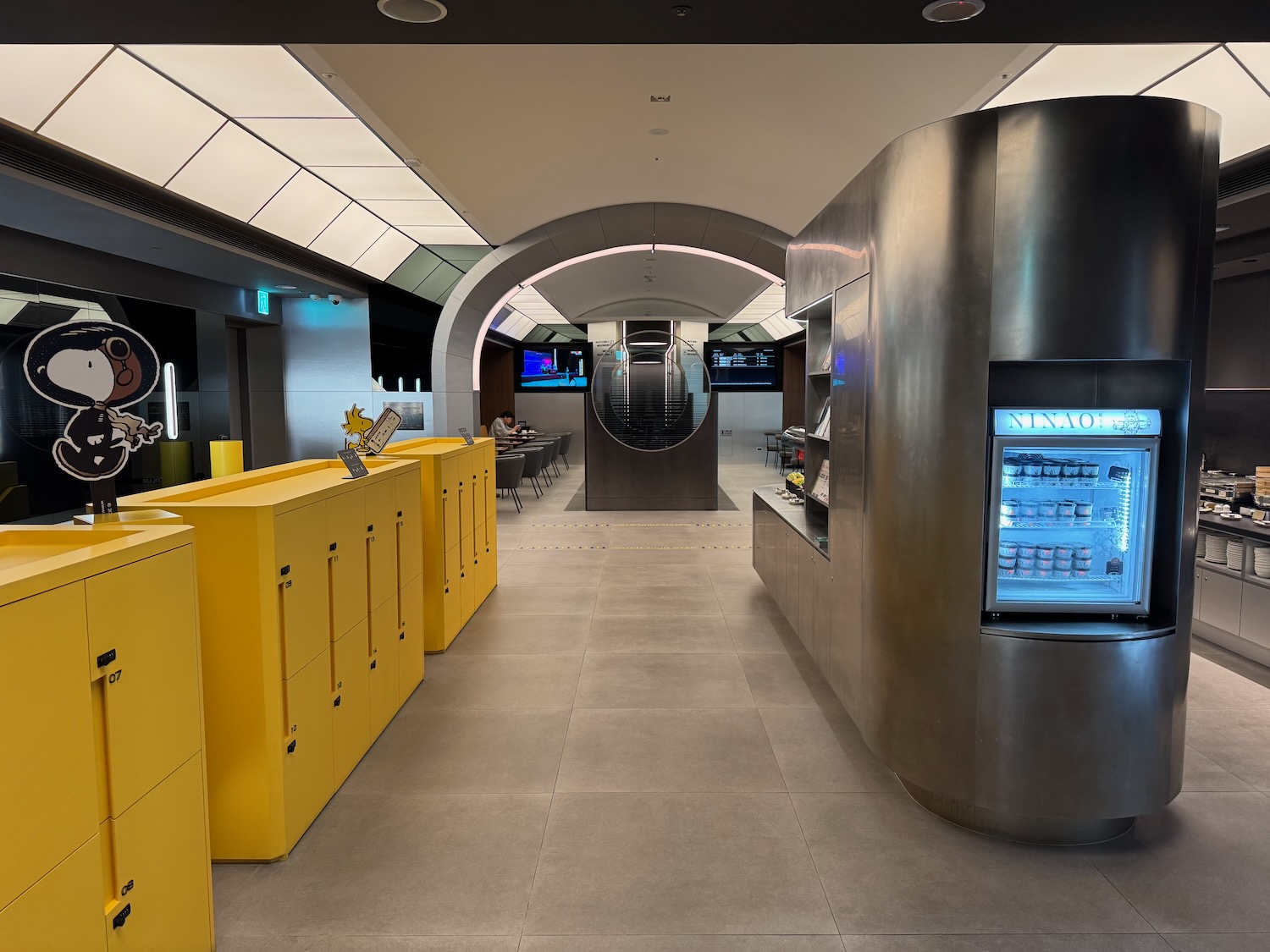 a room with a large counter and a display case