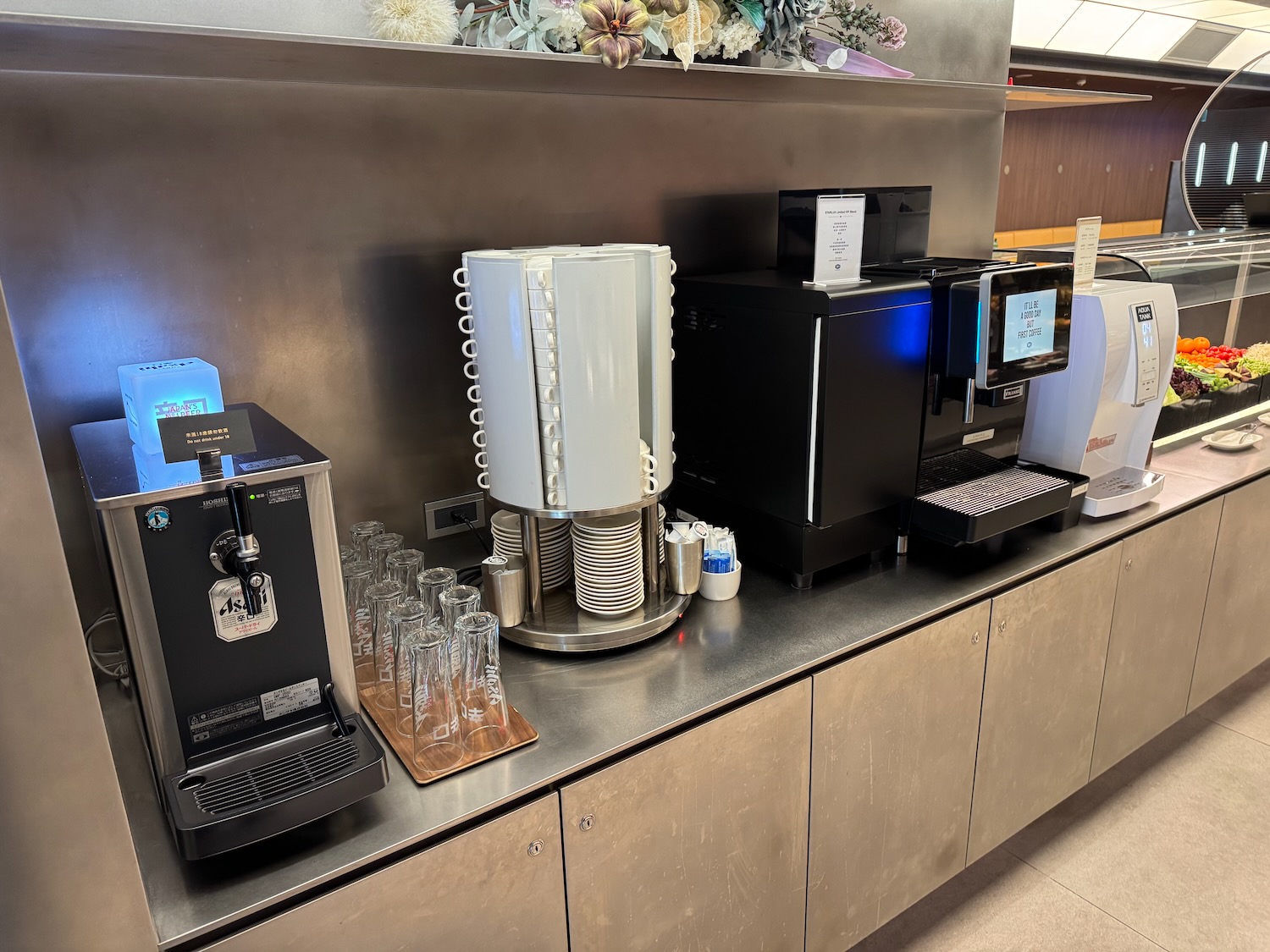 a group of coffee machines on a counter