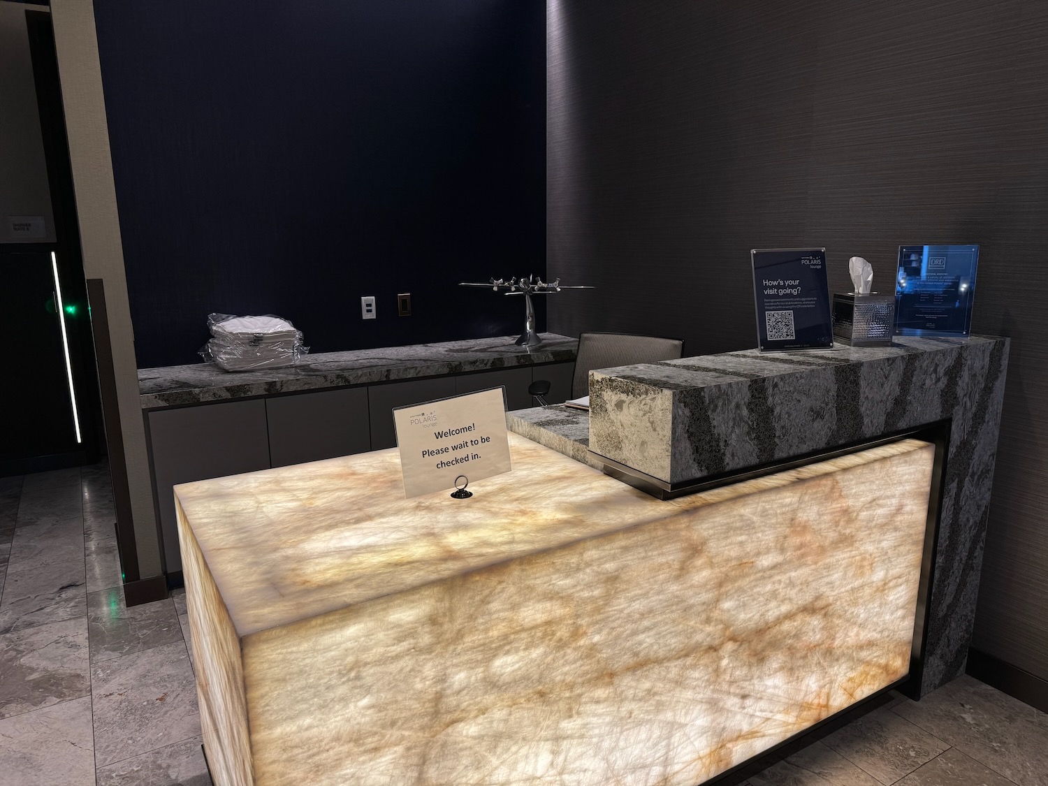 a counter with a sign on it