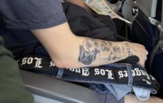 United passenger takes off pants