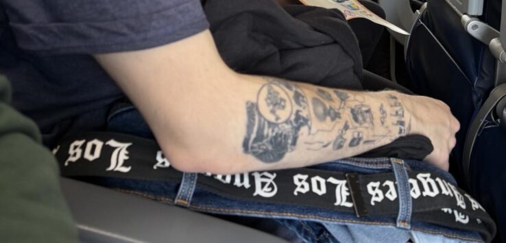 United passenger takes off pants