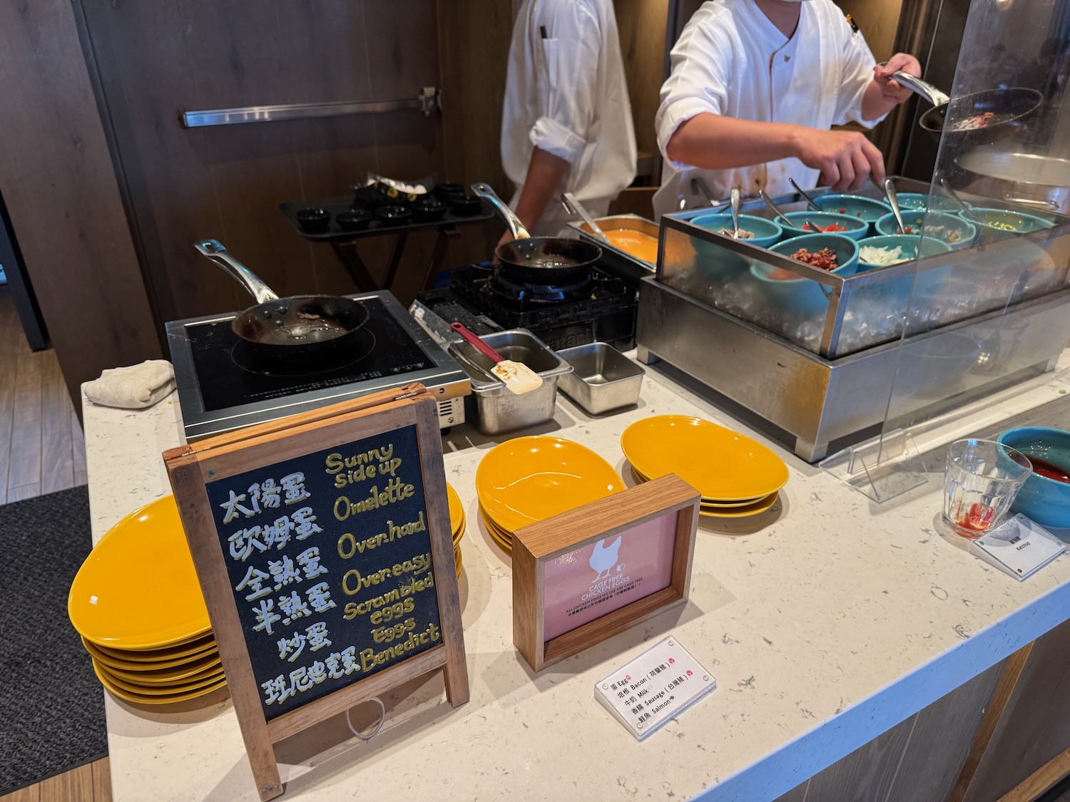 a man cooking food in a kitchen