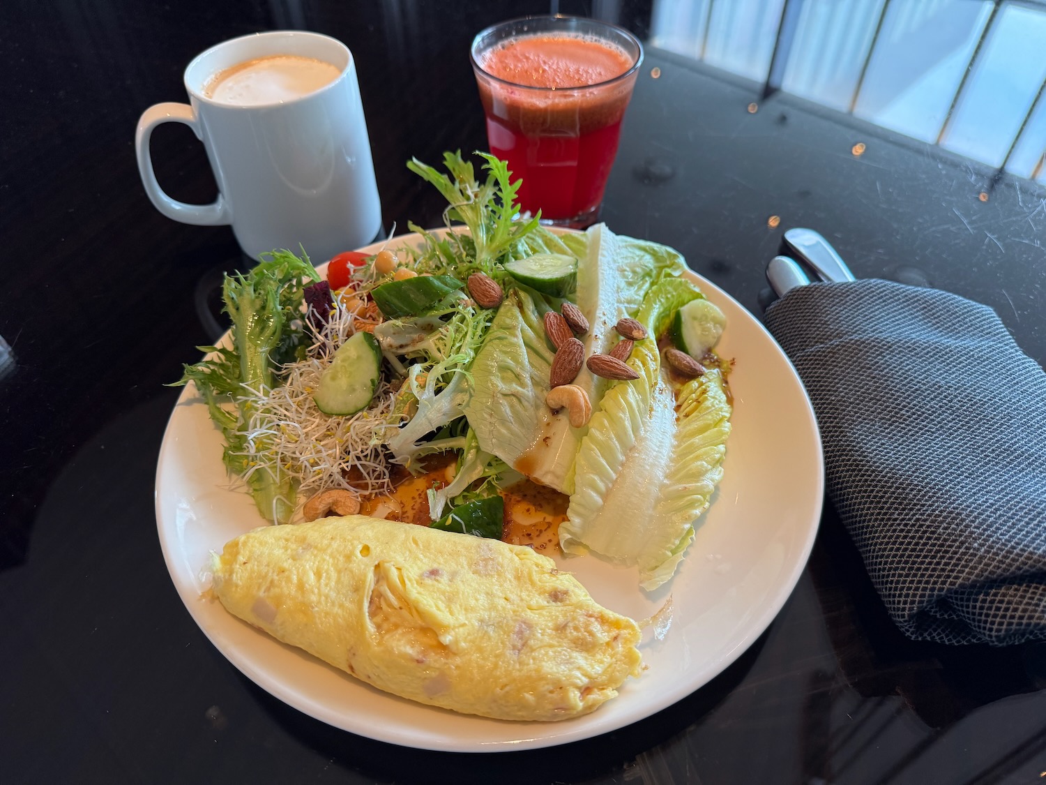 a plate of food and a drink