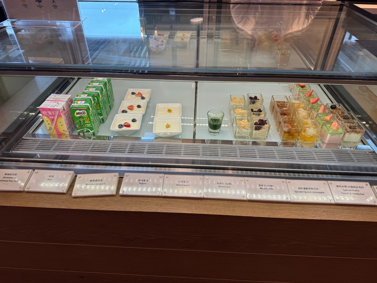 a display case with different food items on it