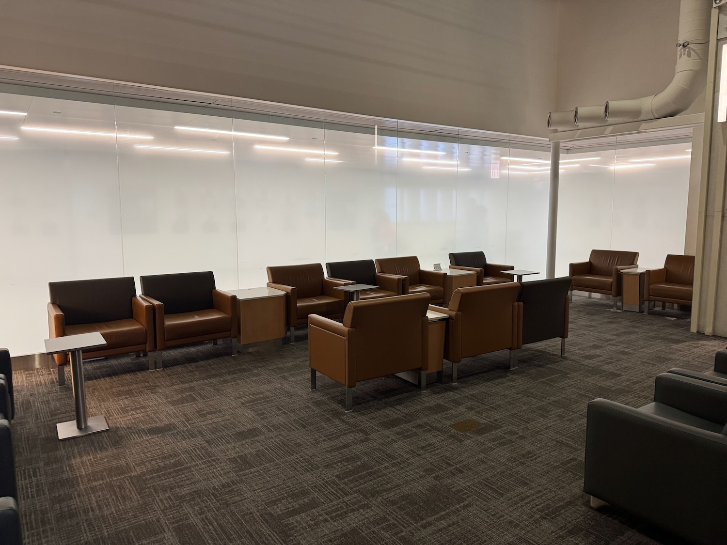 a room with chairs and tables