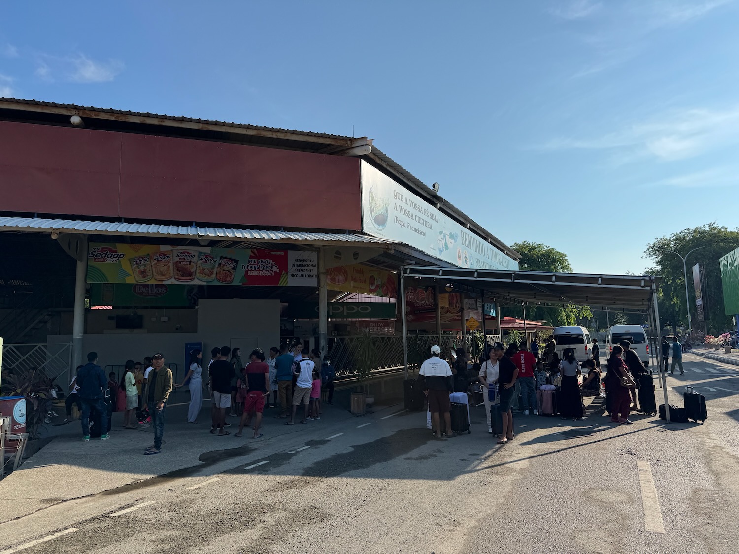 a group of people standing outside a building