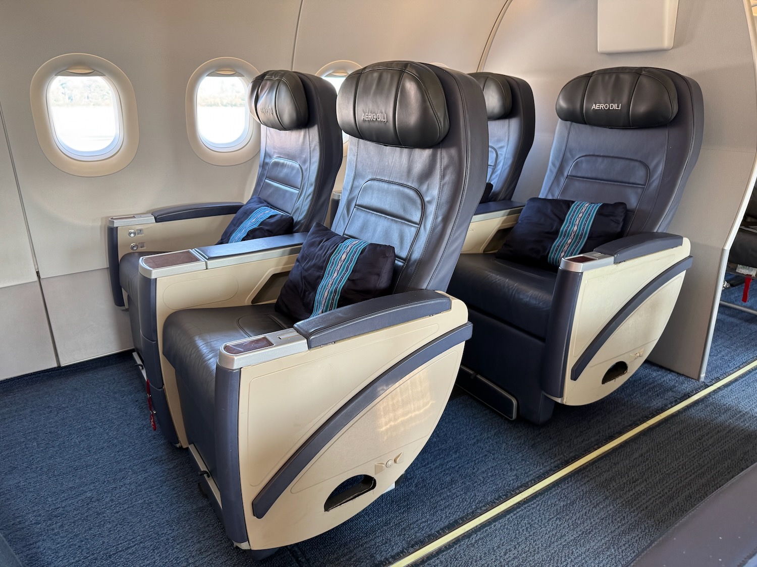 a row of chairs in an airplane