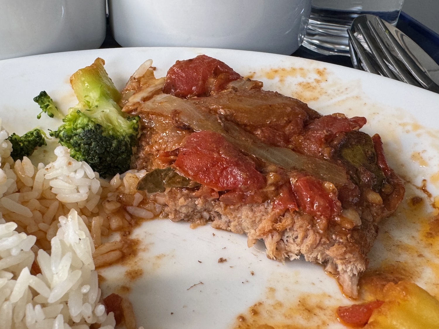 a plate of food with rice and vegetables