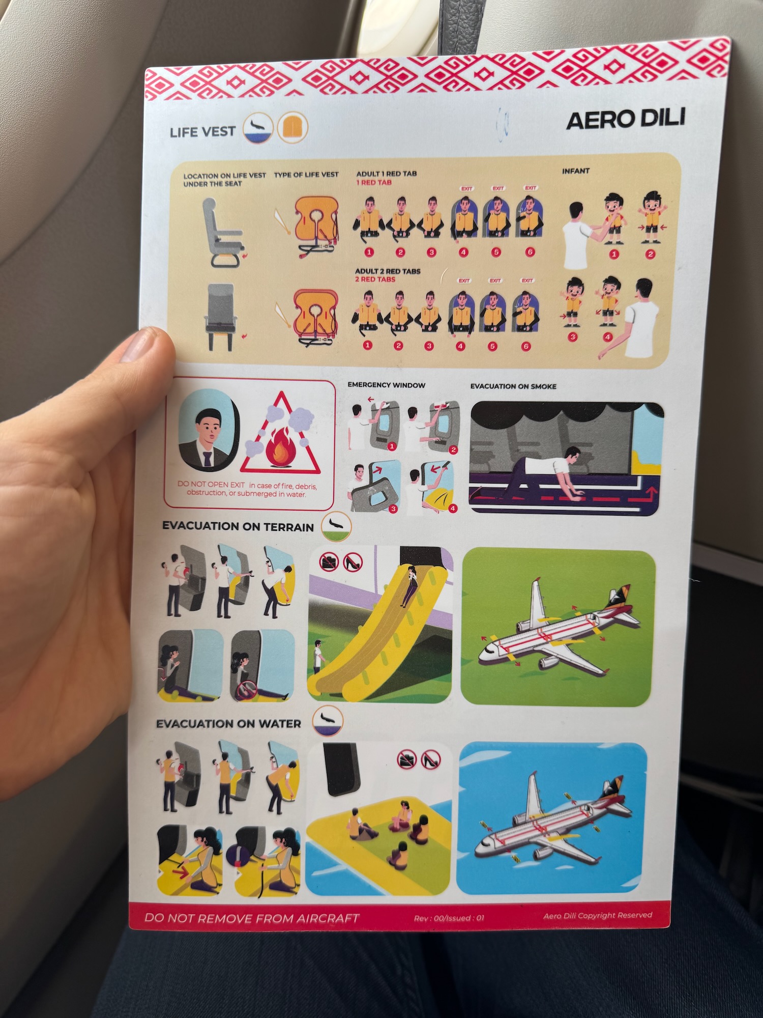 a hand holding a paper with instructions