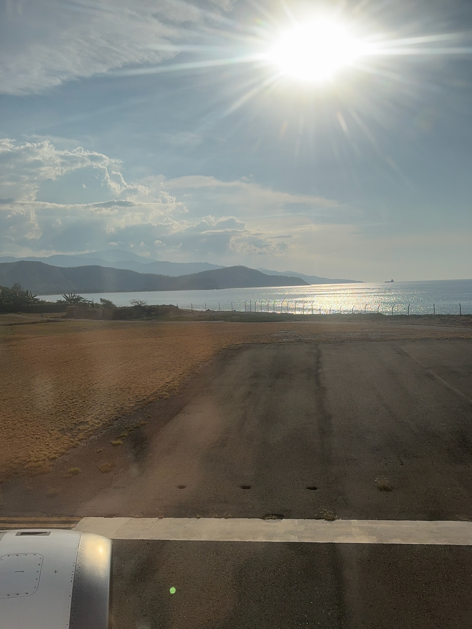 a view of a beach from a window