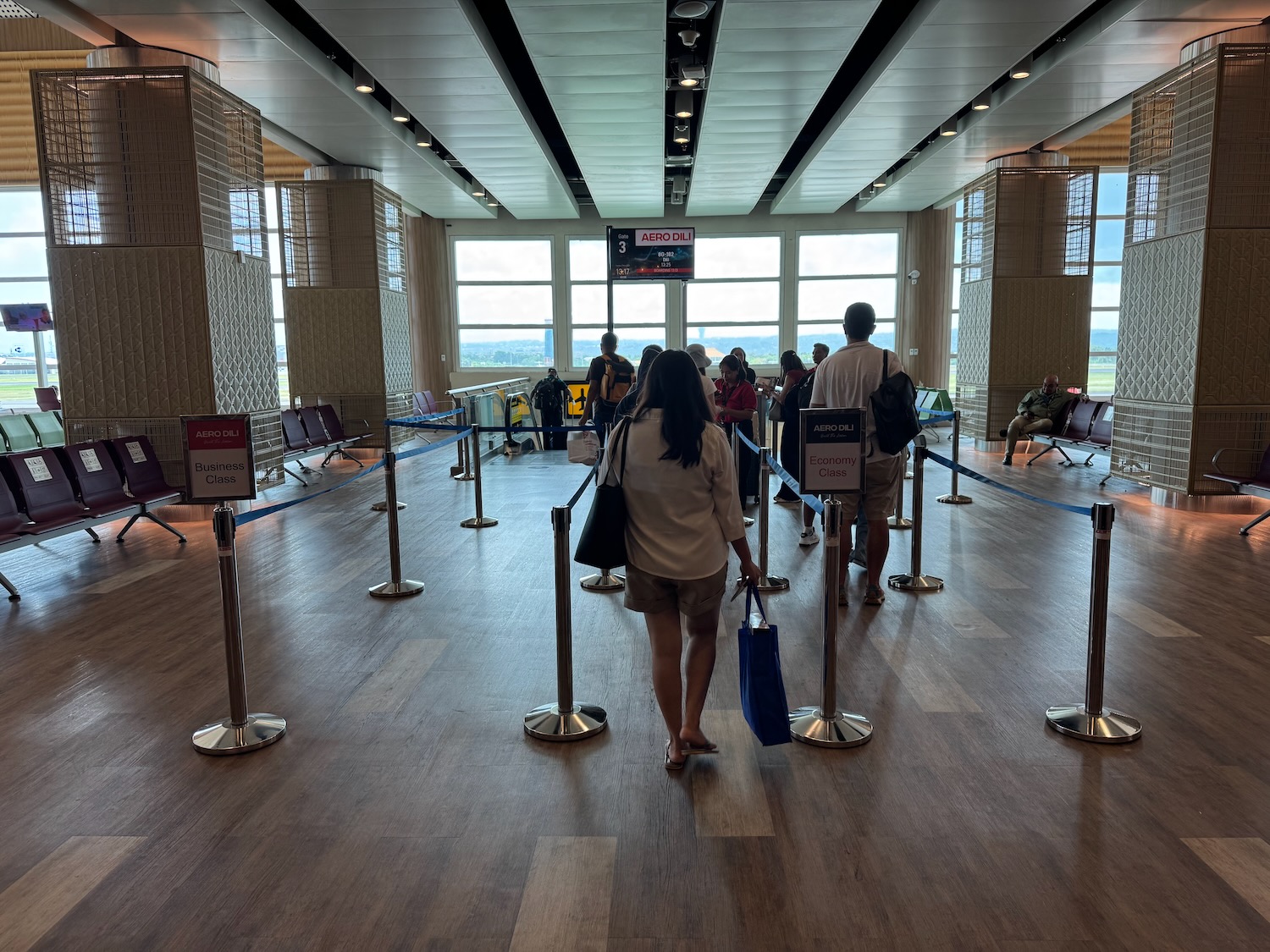 people standing in a room with a group of people