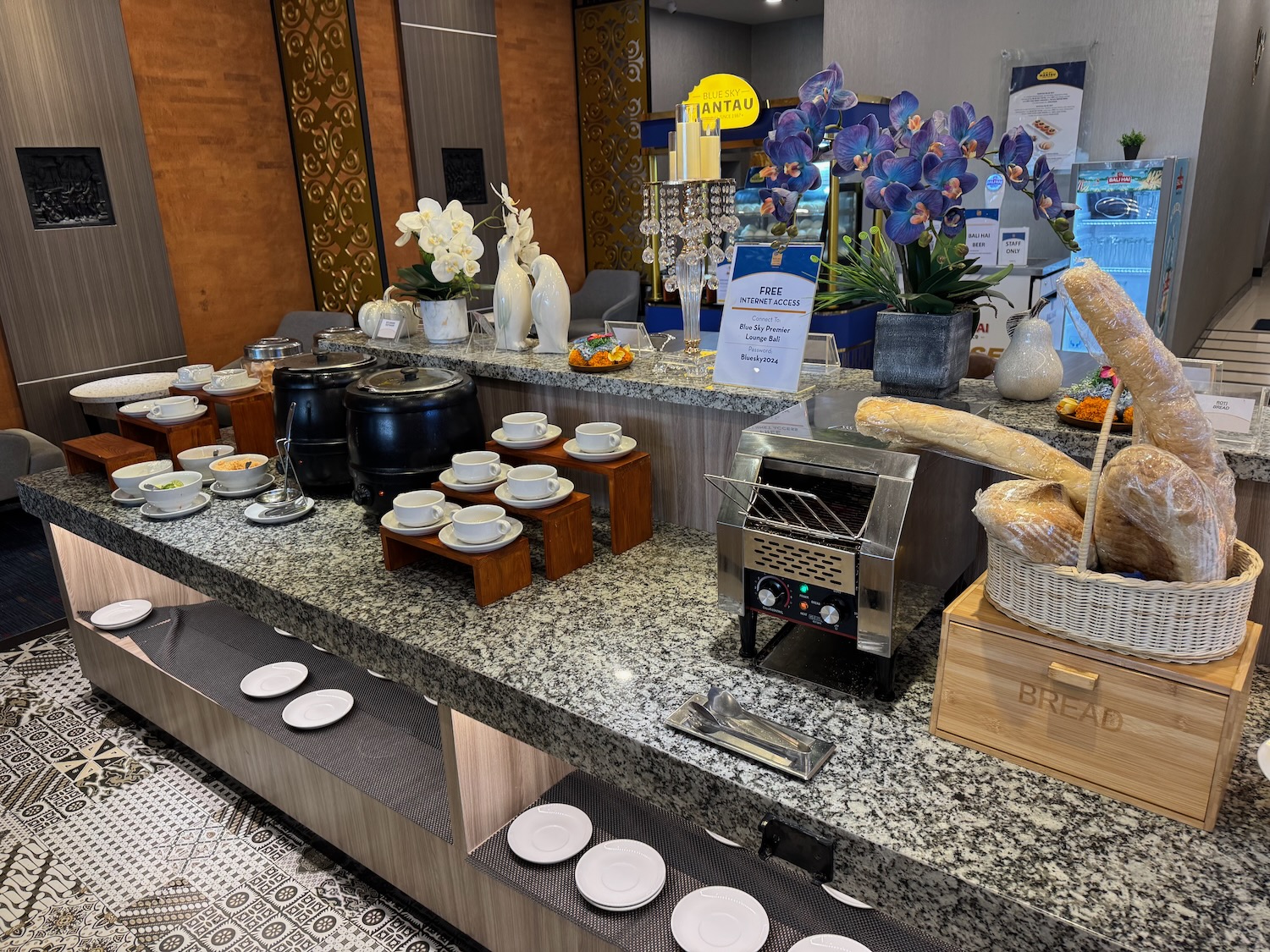 a buffet table with food items on it