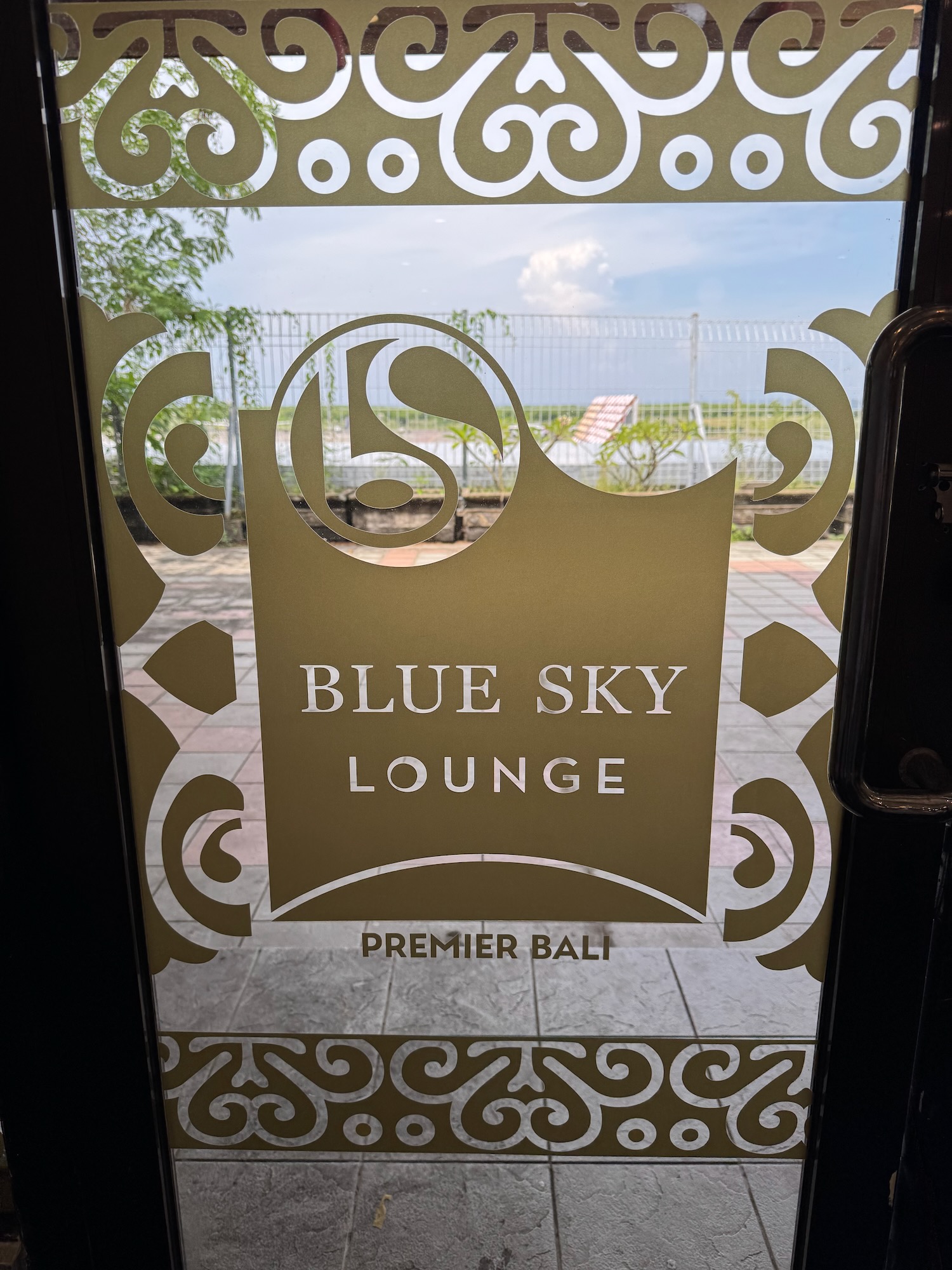 a glass door with a logo on it