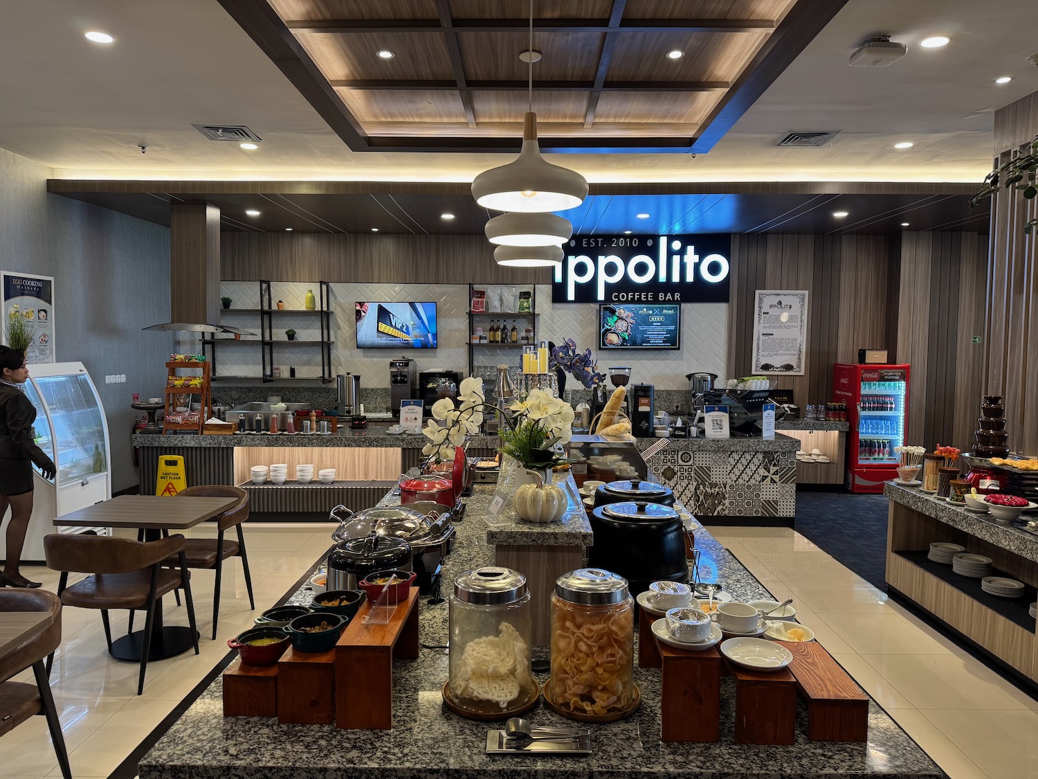 a food court with a counter and a bar
