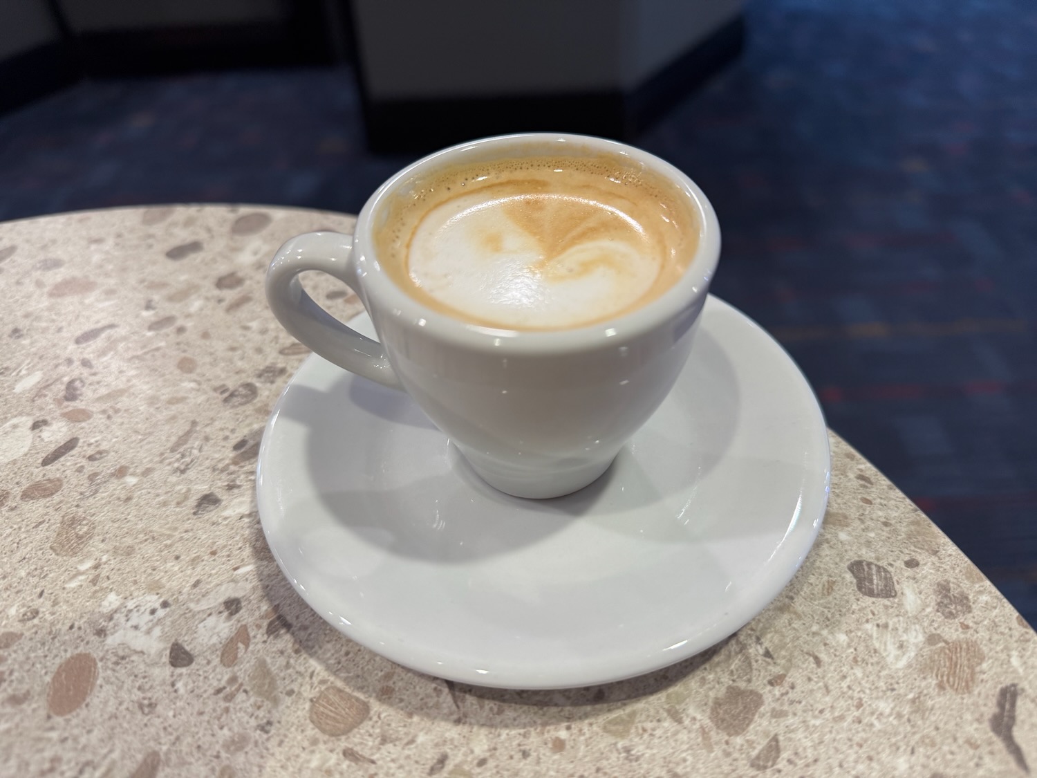 a cup of coffee on a saucer