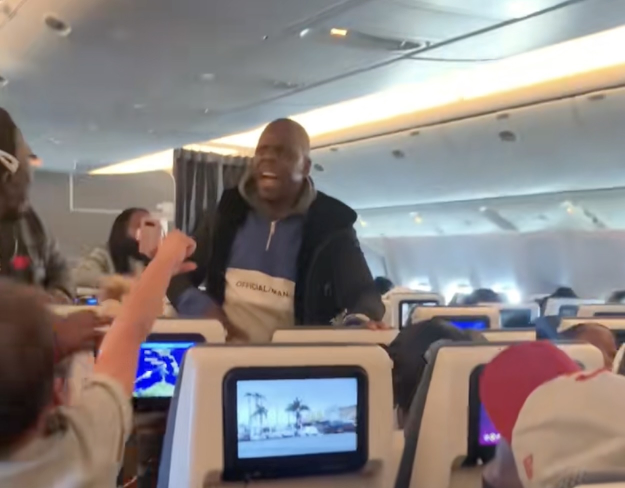 a man sitting in an airplane