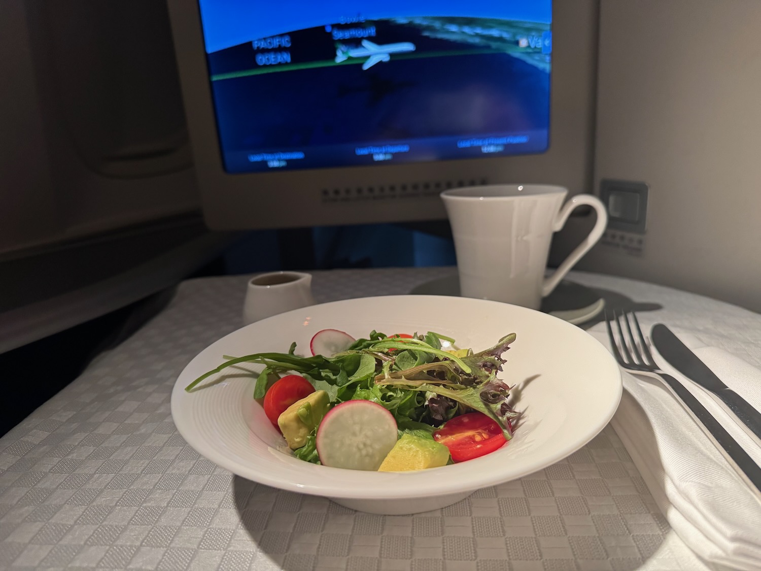 a plate of salad on a table