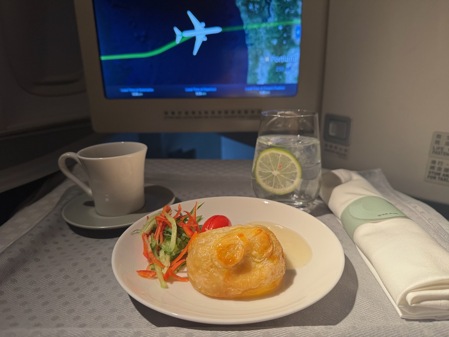 a plate of food and a drink on a table