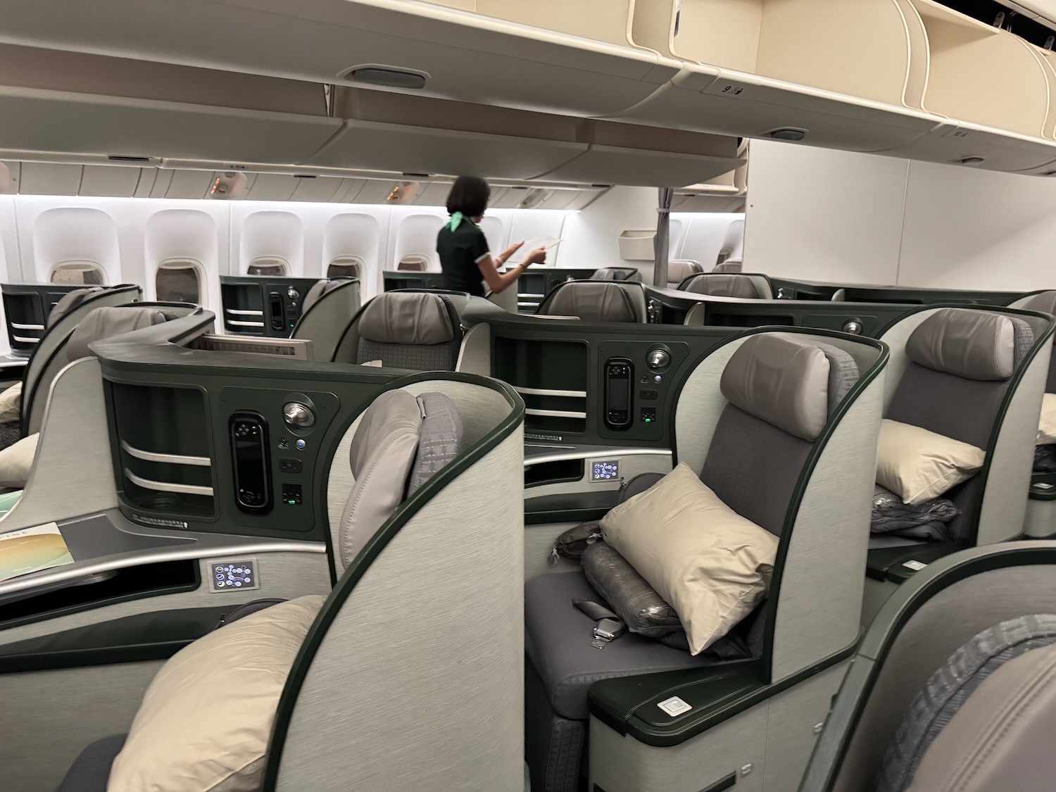 a person standing in a row of seats