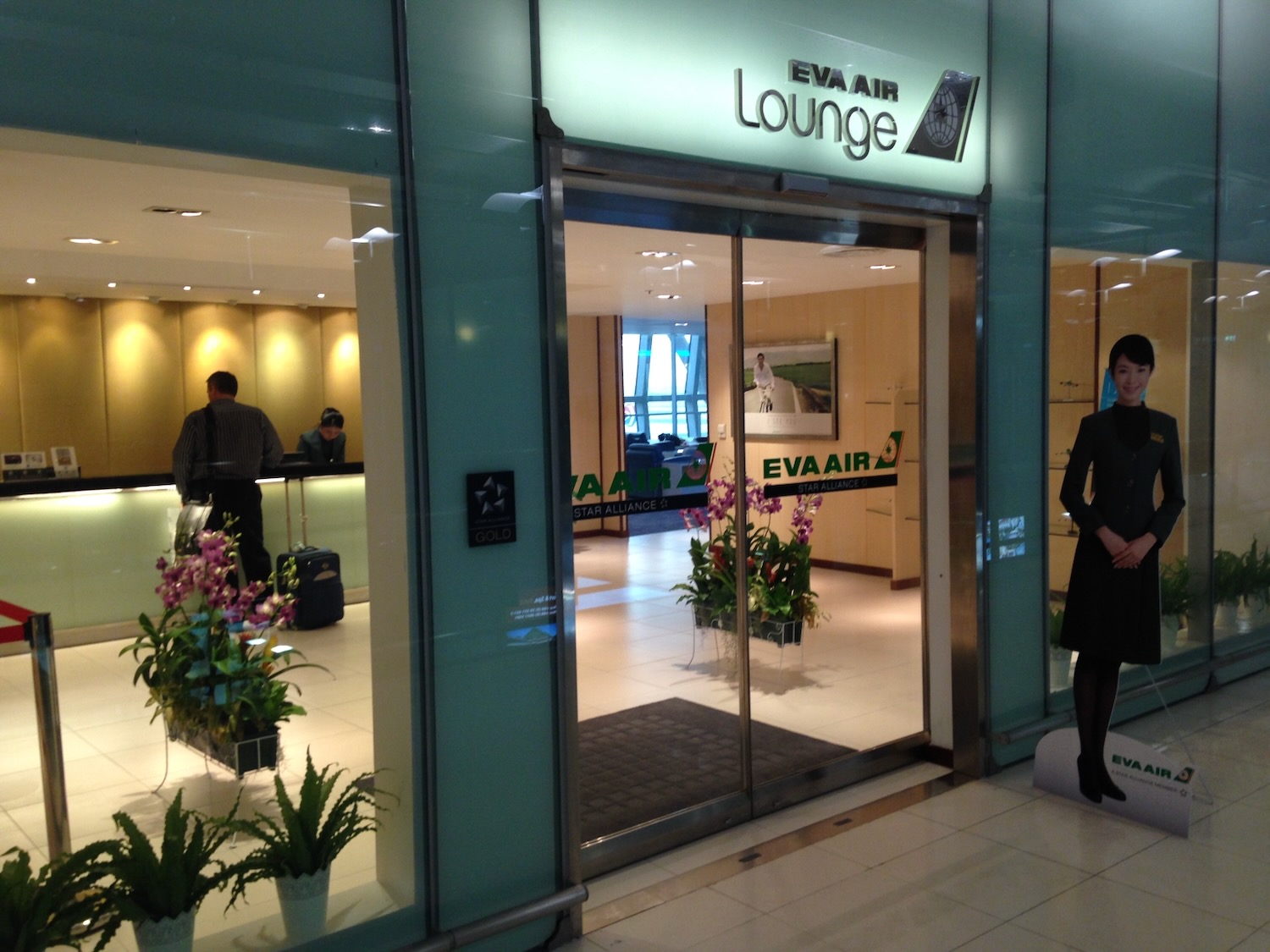 a woman standing outside of a building