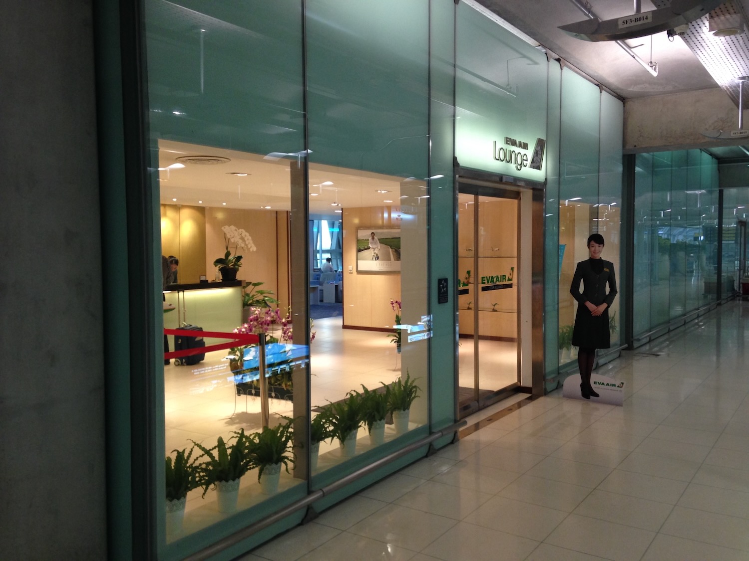 a woman standing in front of a store