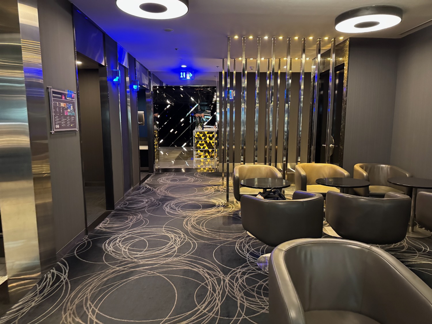 a room with chairs and a wall