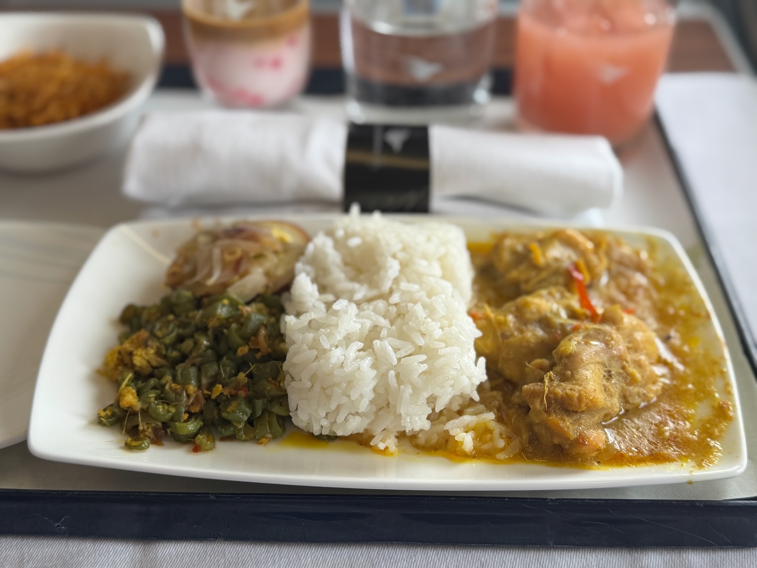 a plate of food on a tray