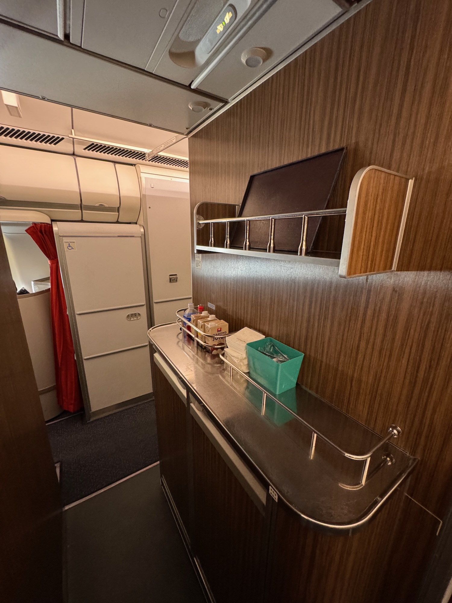 a kitchen with a tv on the wall