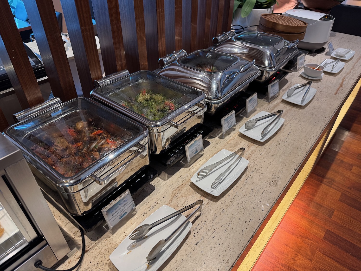 a row of food containers on a table