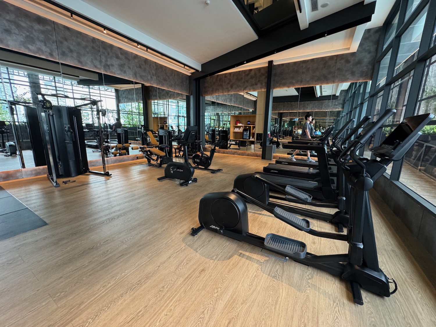 a large room with exercise equipment