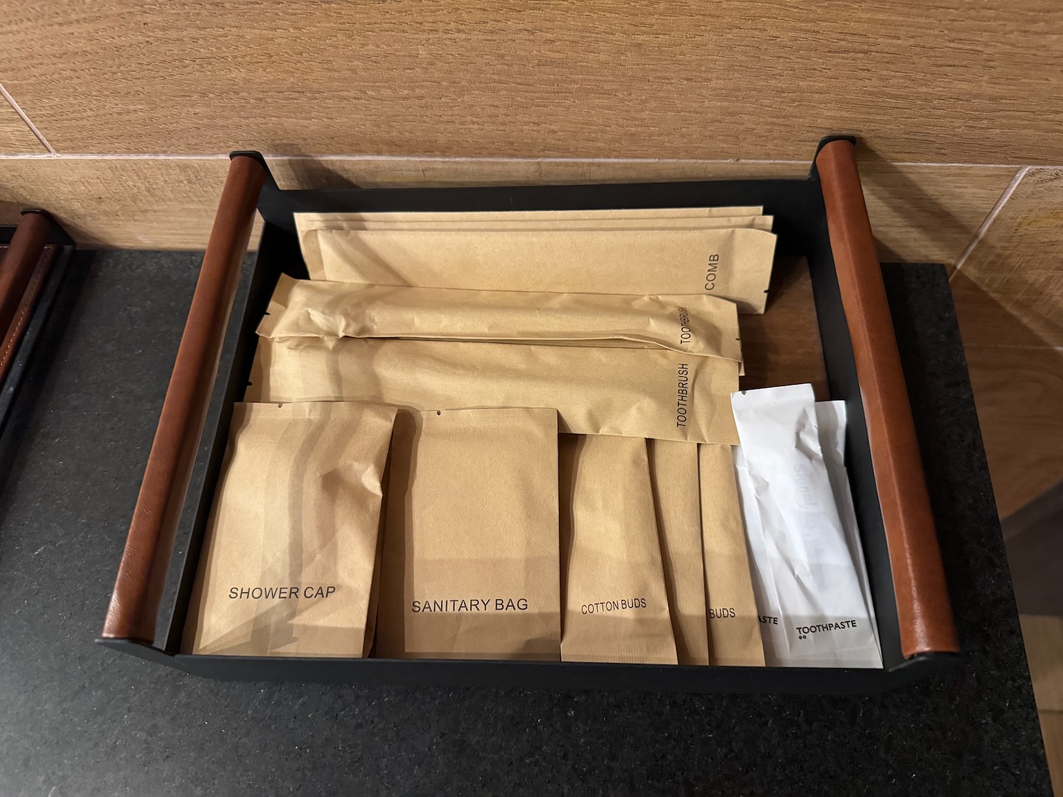 a tray of brown paper bags
