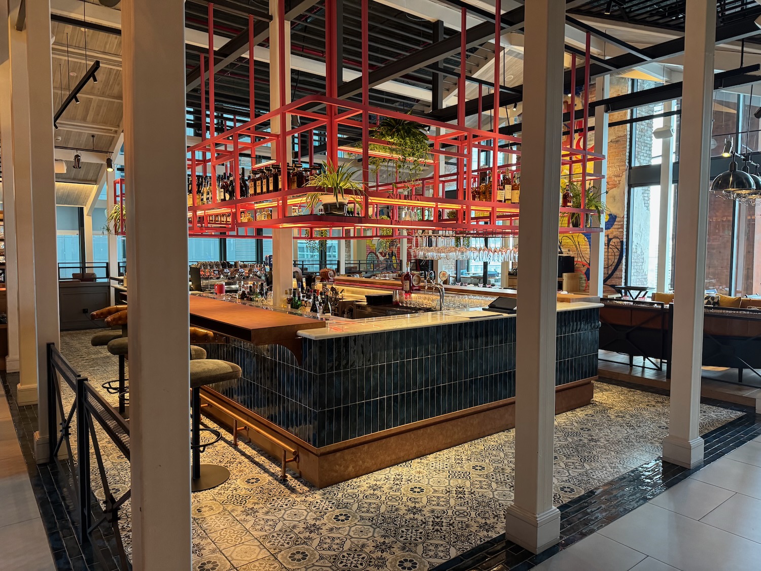 a bar with red bars and shelves
