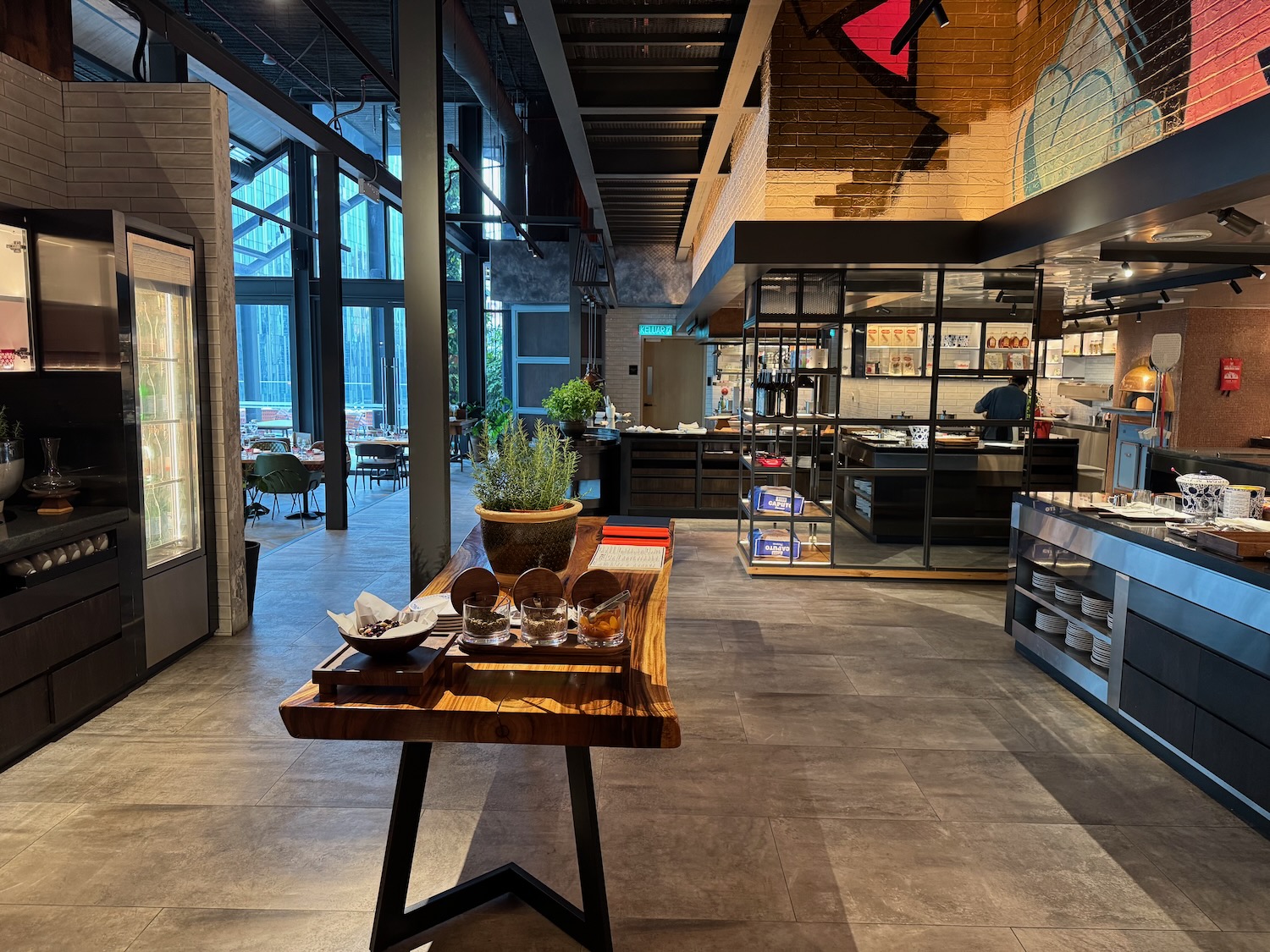 a room with a table and shelves