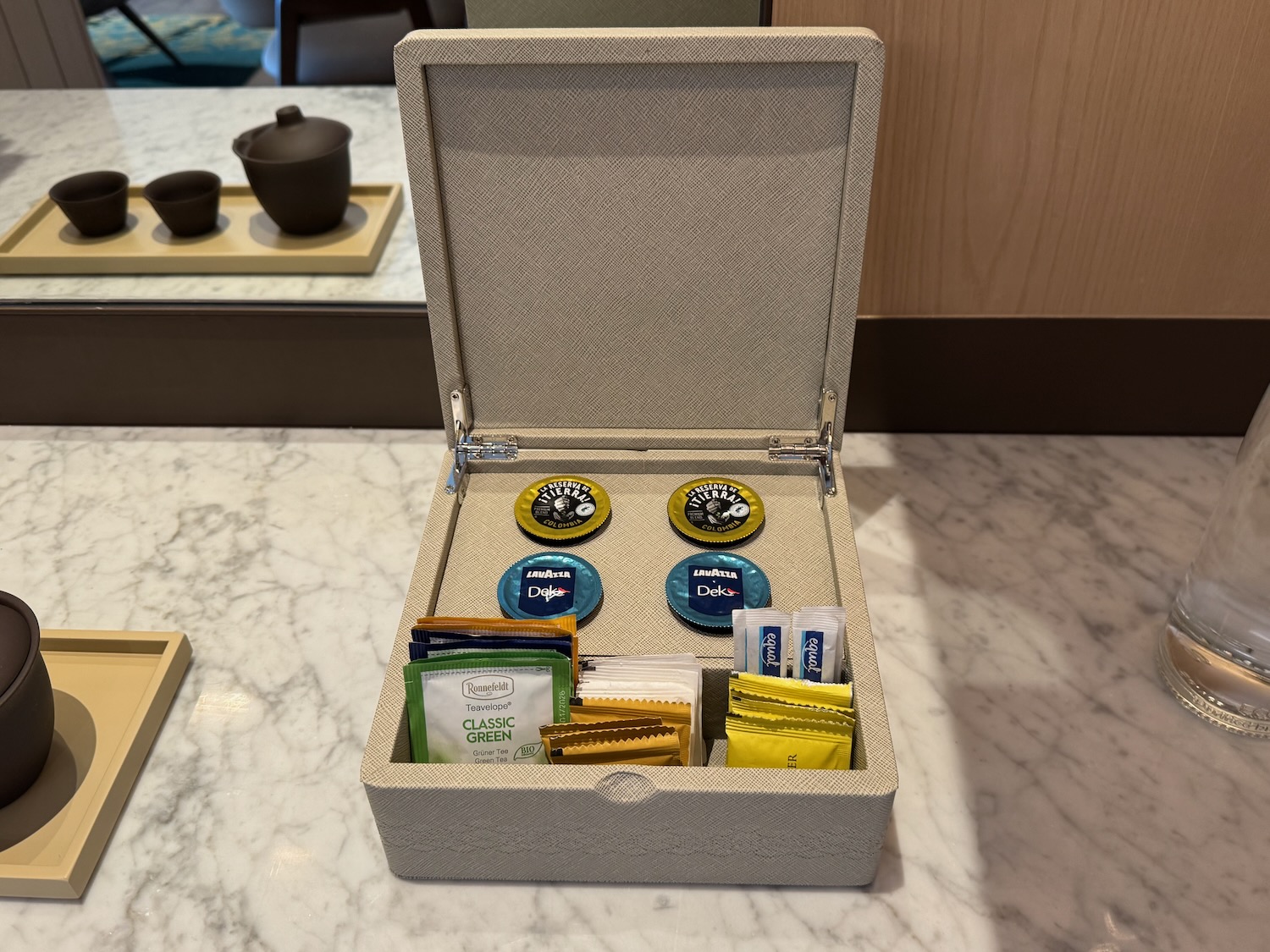 a box with tea bags and tea packets