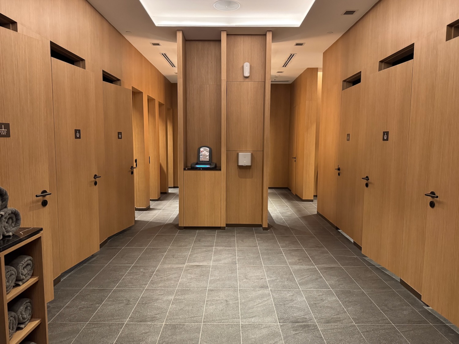 a hallway with wooden doors
